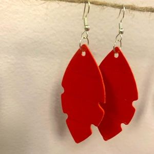 Large red faux leather earrings